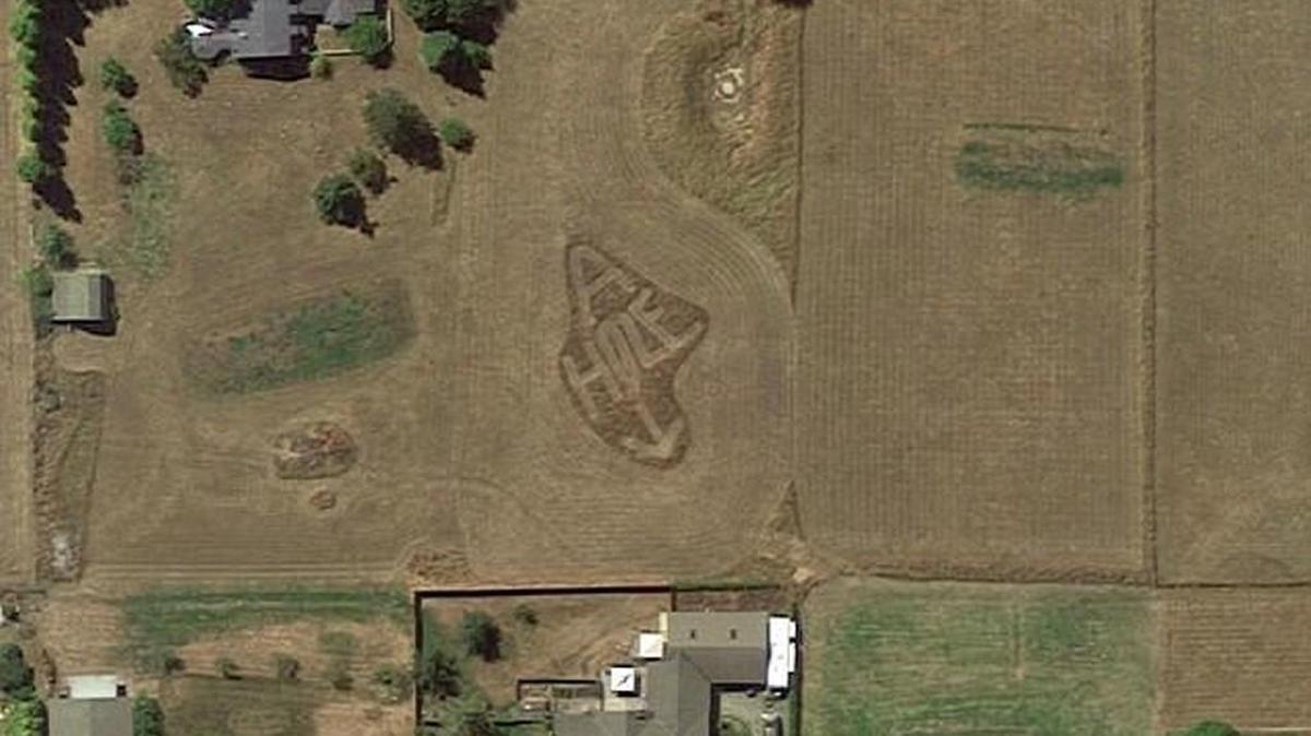 A neighbor having a dispute with another neighbor in Sequim, Wash., expressed frustration by mowing an obscenity into the lawn with a big arrow pointing at the neighbor’s house. Google Earth took a photo of it, and Reddit made the photo go viral.