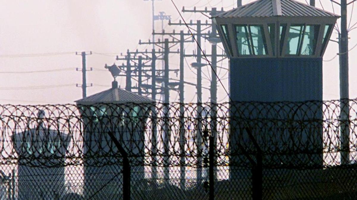 Three guard towers line the western perimeter of Corcoran State Prison in Corcoran, Calif., in this photo taken Jan 6, 2000.