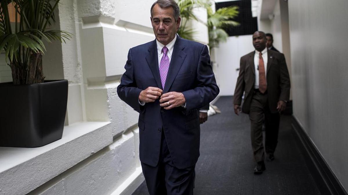 Speaker of the House John Boehner leaves his last weekly press conference on Oct. 27, 2015, with tears in his eyes. If approved by the Congress, the budget deal hammered out between him and the White House would avert a showdown over the federal debt.