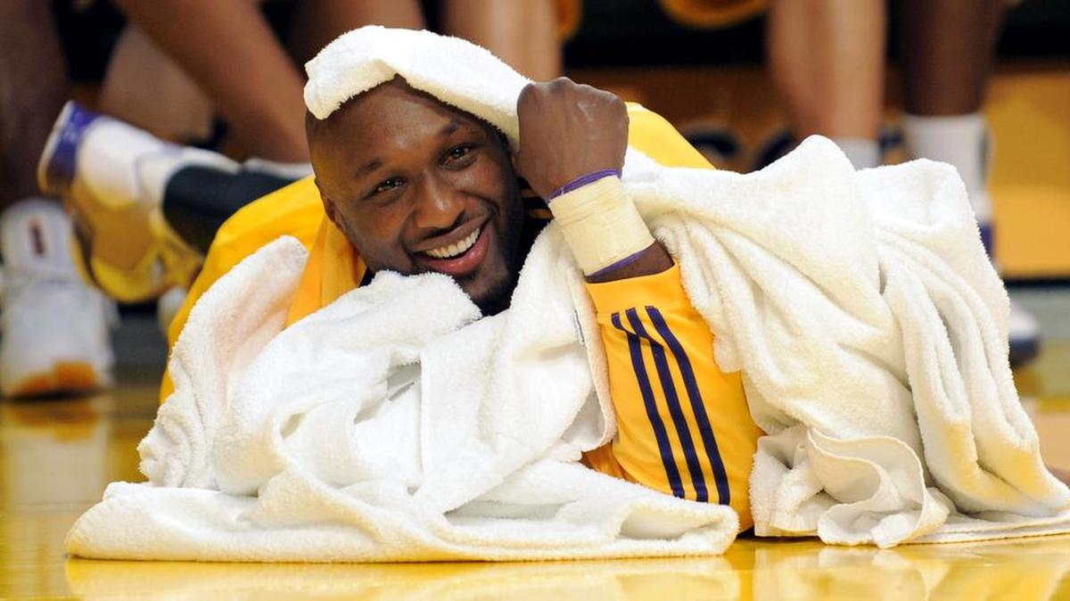 
Then-Los Angeles Lakers forward Lamar Odom watches the fourth quarter against FC Barcelona during their NBA preseason basketball game in Los Angeles on Saturday, Oct. 18, 2008.
