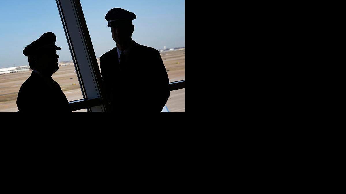 
Other occupations where a high degree of public safety is involved often require more thorough mental health evaluations than commercial pilots, shown in this Feb. 14, 2013, photo.


