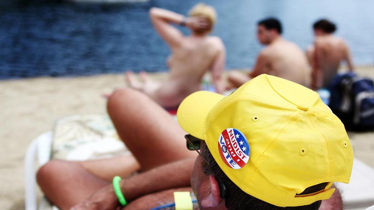 Women sunbathing topless in the resort town of Ocean City, Maryland, will not be approached by beach patrol officers while the law that forbids it is under review. This 2009 file photo is from a resort in North Woodstock, N.Y.