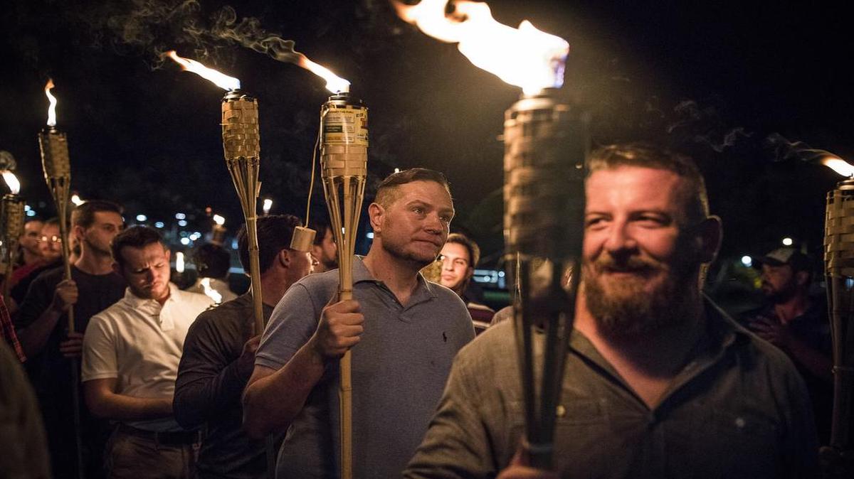 A torch-lit march by white nationalists through the grounds of the University of Virginia in Charlottesville, Va., Aug. 11, 2017. Lamplight Farms, whose Tiki torches were used by white nationalist protesters, said, “We do not support their message or the use of our products in this way.”