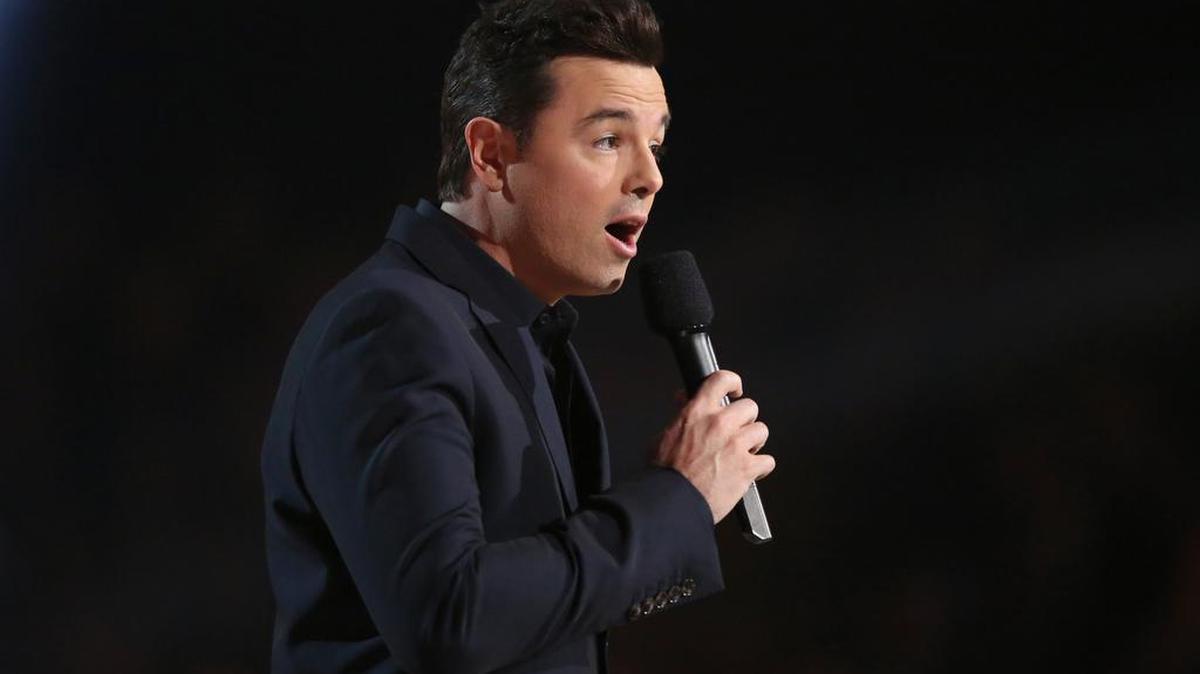 “Family Guy” creator Seth MacFarlane presents an award at the 58th annual Grammy Awards in Los Angeles.
