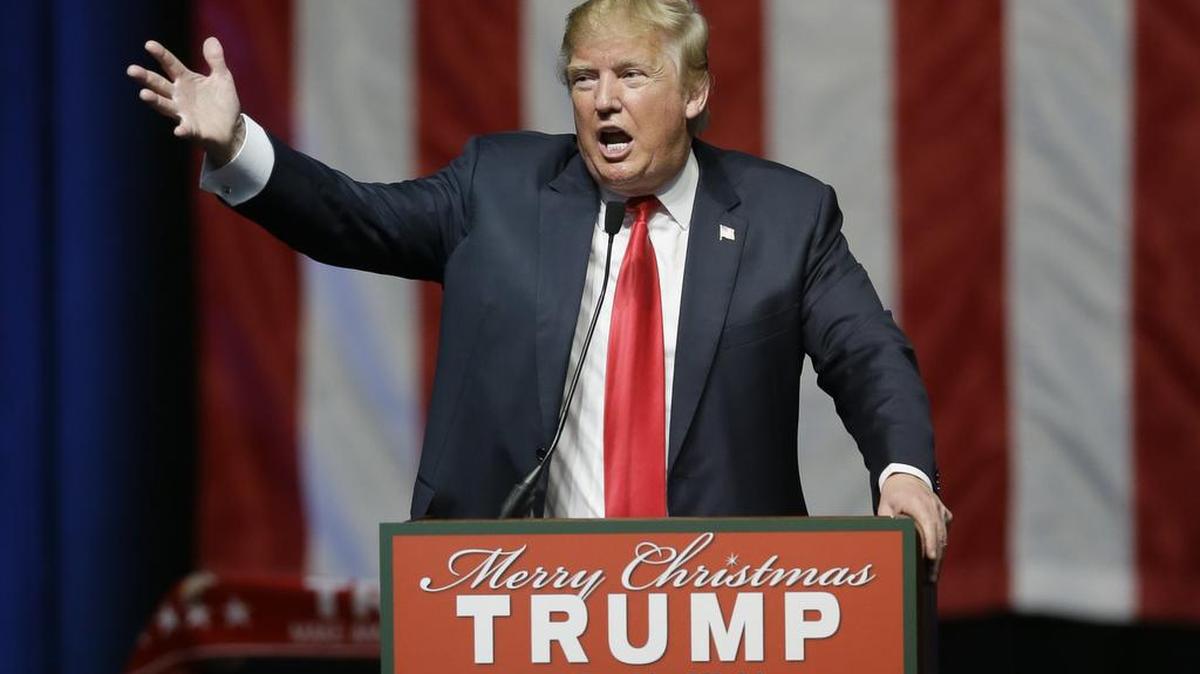 Republican presidential candidate, businessman Donald Trump addresses supporters at a campaign rally, Monday, Dec. 21, 2015, in Grand Rapids, Mich.