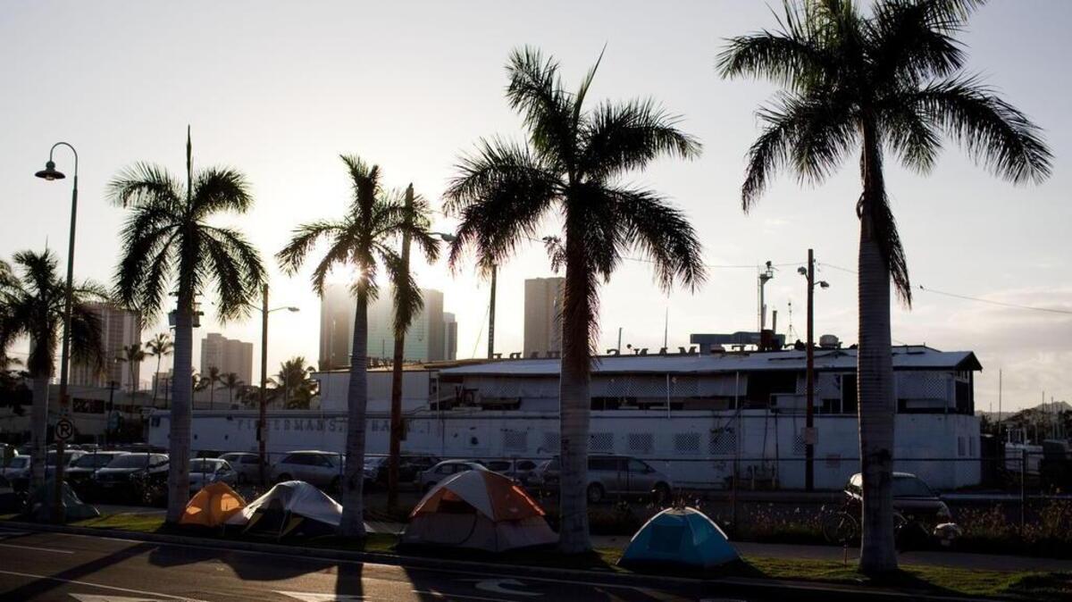A homeless camp near Kakaako Waterfront Park, in Honolulu, in 2011. Hawaii lawmakers are considering a unique solution to the housing crisis: They want to make it possible for people to live in traditional Hawaiian grass huts.