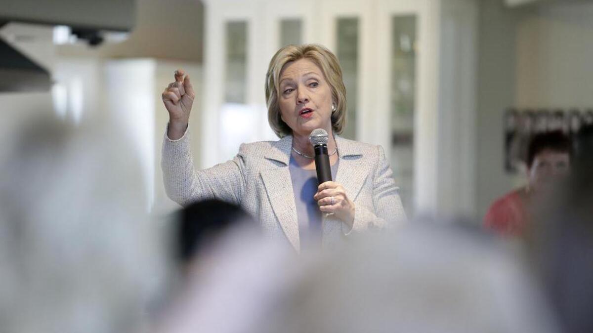 
Democratic presidential candidate Hillary Rodham Clinton speaks during a house party on July 26, 2015, in Carroll, Iowa. 

