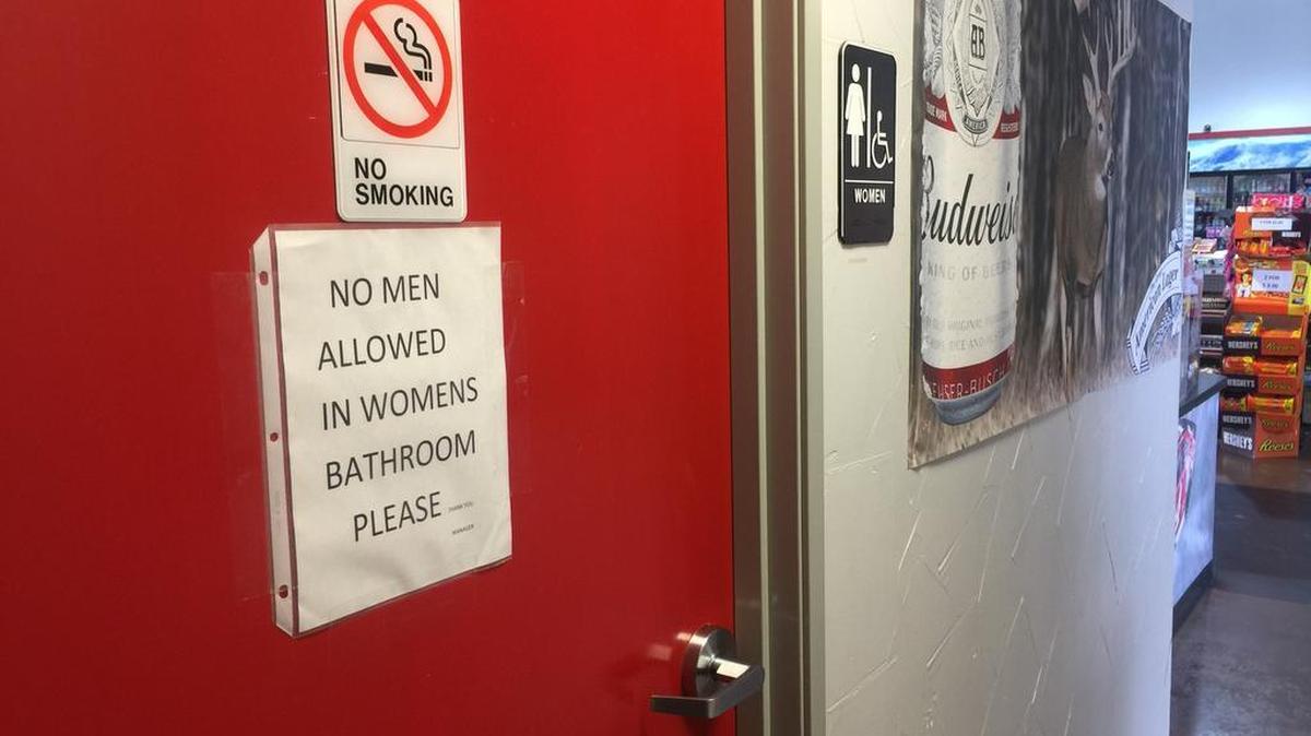 A sign on the women’s bathroom door at the Texaco Station and BBQ on the Brazos restaurant seems to make clear the owner’s stance on the transgender restroom issue.