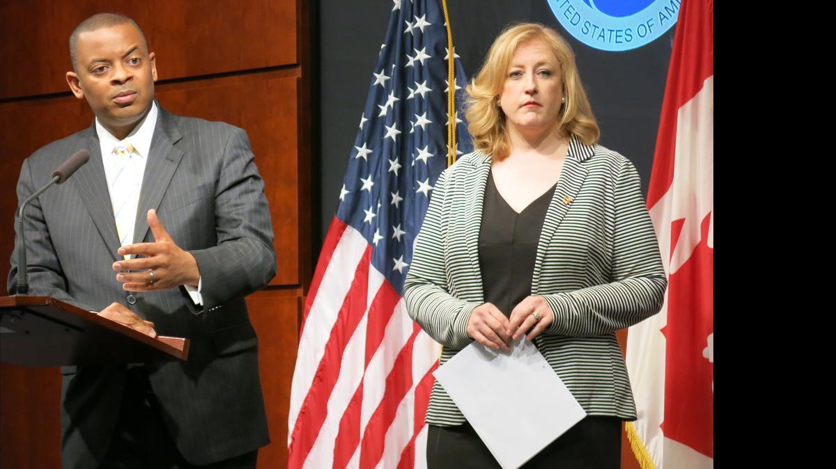 
U.S. Transportation Secretary Anthony Foxx and Transport Canada Minister Lisa Raitt outline new safety regulations for oil and ethanol trains in Washington on Friday, May 1, 2015.
