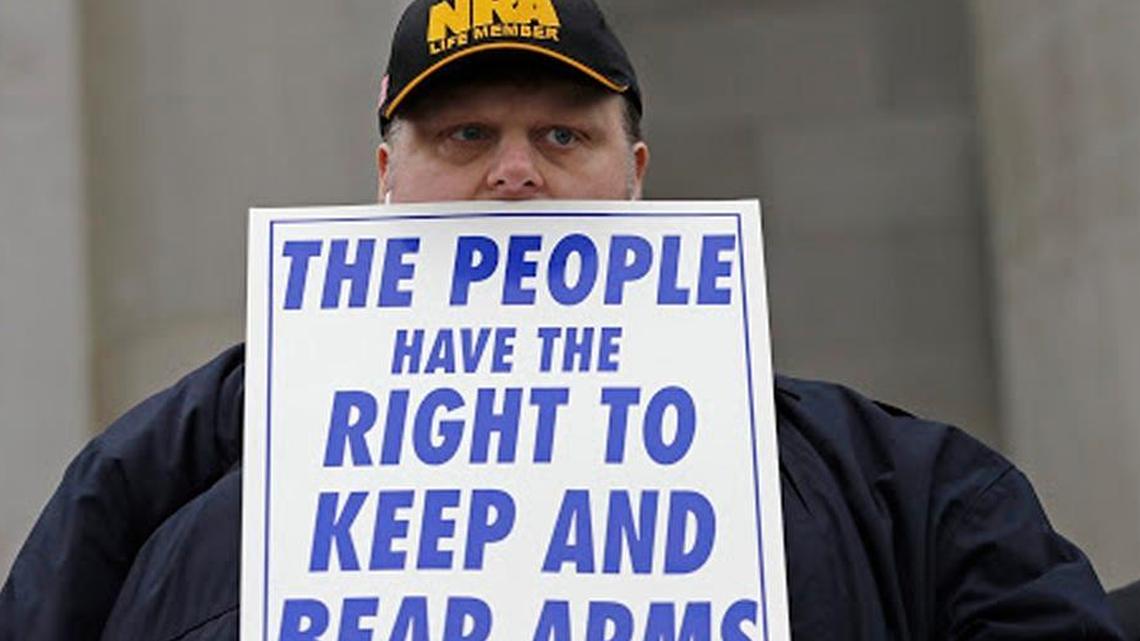 A participant at gun rights rally at the Capitol in Olympia, Wash.