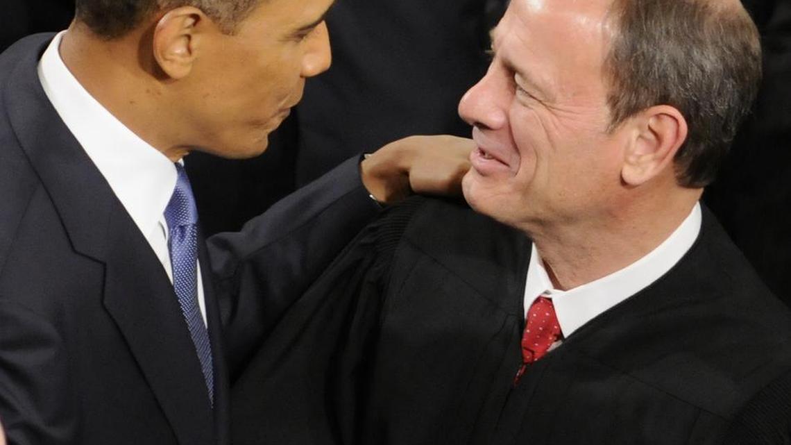 Chief Justice John Roberts (right, with President Obama) learned how to sign ‘Your motion is granted.’