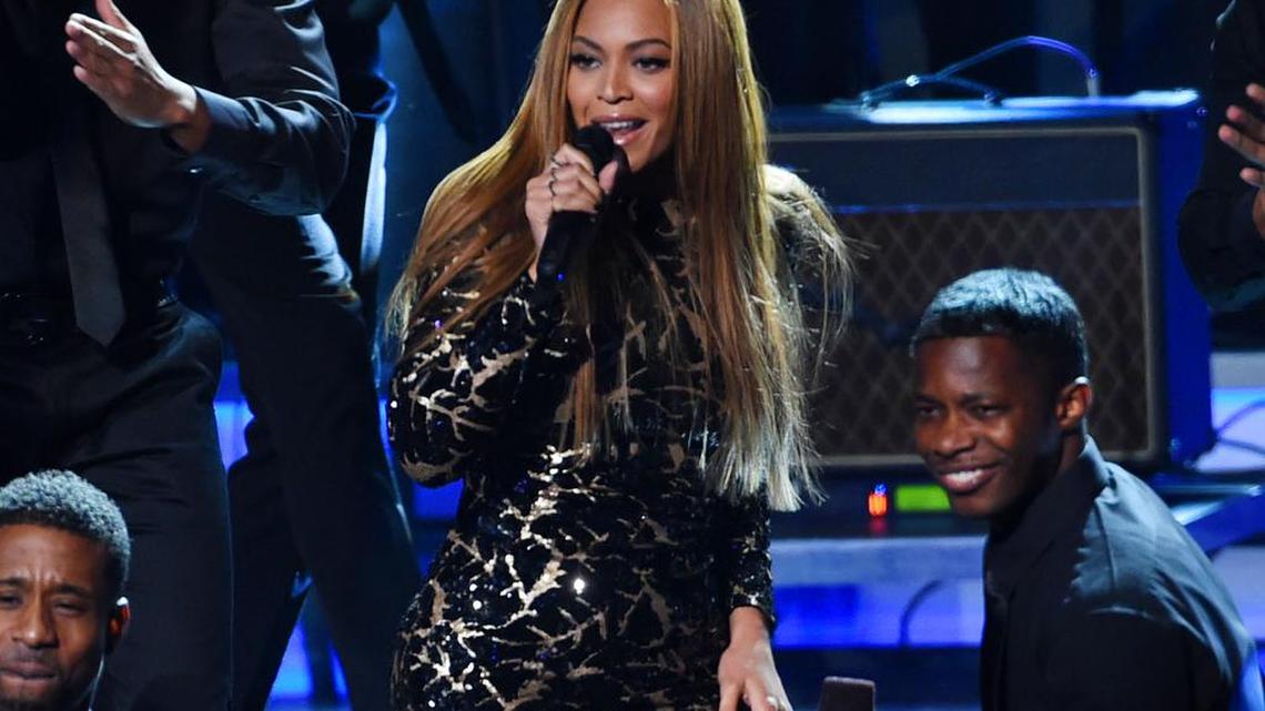 In this Feb. 10, 2015, file photo, Beyonce performs at "Stevie Wonder: Songs in the Key of Life - An All-Star Grammy Salute," at the Nokia Theatre L.A. Live in Los Angeles.