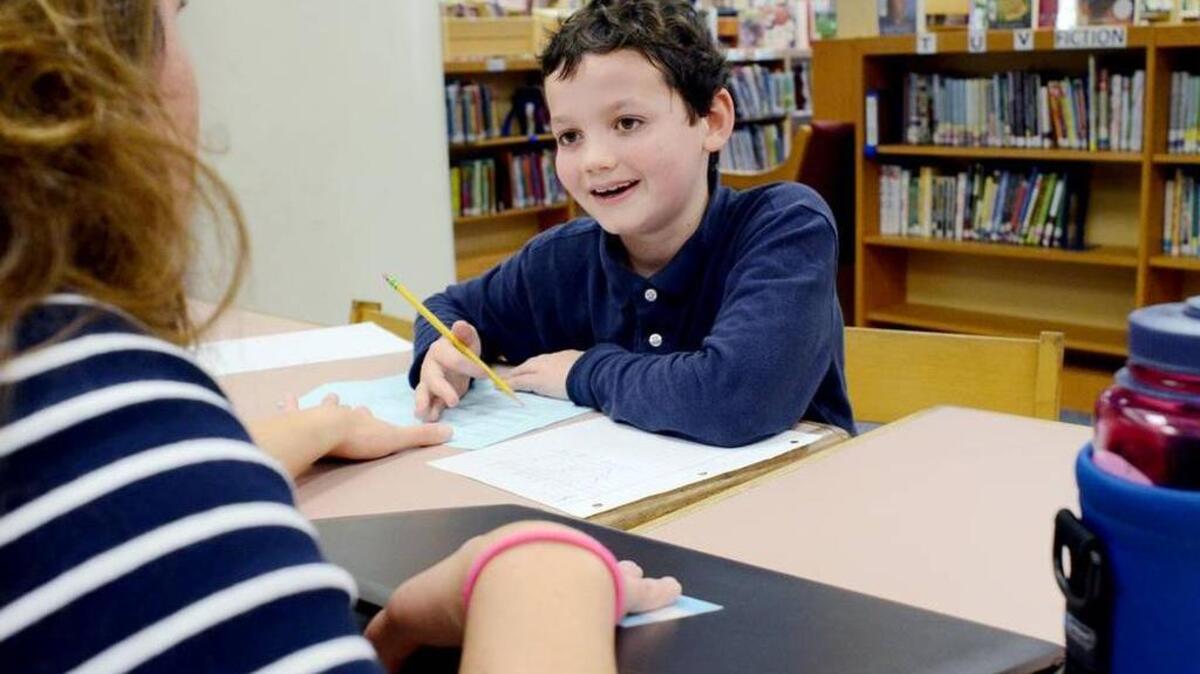 Hilton Head Island School for the Creative Arts student Alex Arrieta, 9, gets caught up on classwork with after-school tutoring session with teacher Sandra Walsh on on Dec. 9, 2015. Alex had missed a lot of school after he was diagnosed with leukemia in February and began chemotherapy that month. Alex, now 10, celebrated the holidays cancer-free but the Hilton Head Island boy's family learned the cancer has returned.