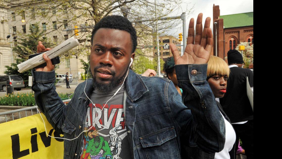 
William Stewart, a friend of Freddie Gray, protests outside City Hall in Baltimore, April 20, 2015. Stewart said Gray was like a little brother to him.
