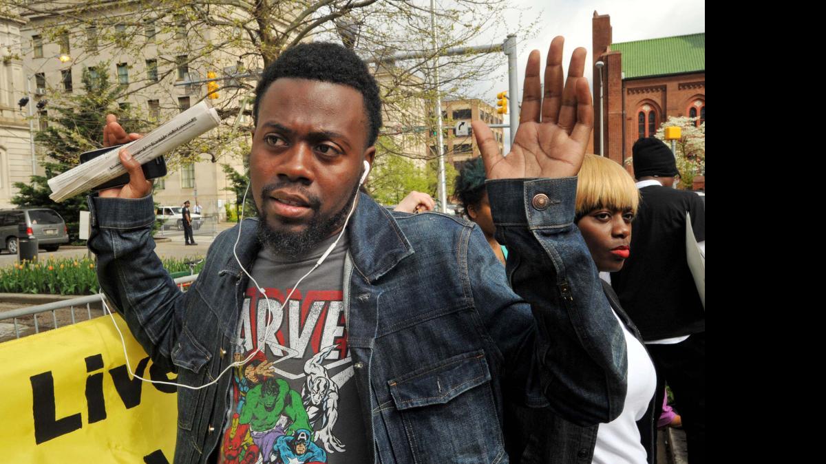 
William Stewart, a friend of Freddie Gray, protests outside City Hall in Baltimore, April 20, 2015. Stewart said Gray was like a little brother to him.

