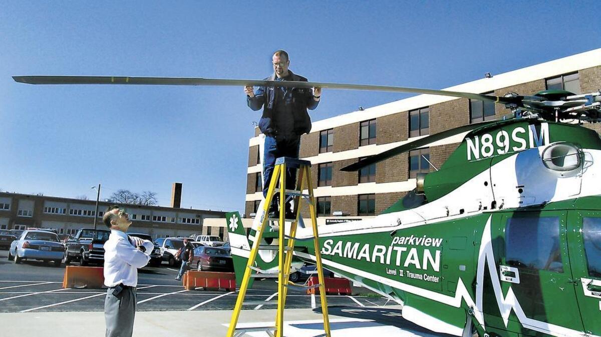 Parkview Samaritan helicopter pilot Brad Wilson checks the rotor blade for damage after being struck by a bird while flying in 2004 in Bryan. Reports of helicopter bird strikes are up dramatically in recent years, including incidents that damage the aircraft and create the potential for crashes, according to the Federal Aviation Administration. In 2013, there were 204 reported helicopter bird strikes, a 68 percent increase from 2009 when there were 121 reports and an increase of over 700 percent since the early 2000s, said Gary Roach, an FAA helicopter safety engineer.