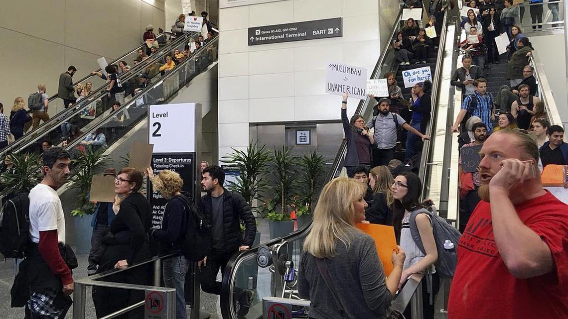 Demonstrators crowd the international terminal as they protest against President Donald Trump's travel ban on refugees and citizens of seven Muslim-majority nations, at San Francisco International Airport on Sunday, Jan. 29, 2017.