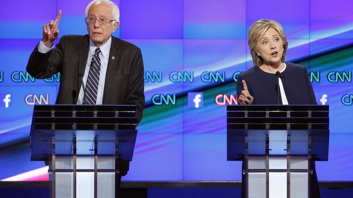 Democratic presidential candidates Hillary Rodham Clinton and Sen. Bernie Sanders, I-Vt., speak during an Oct. 13, 2015, debate in Las Vegas.