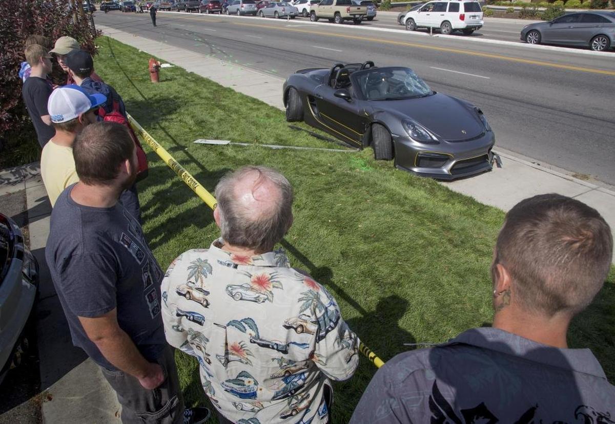 The Porsche came to rest on a sidewalk after if slammed into numerous bystanders along Overland Road.