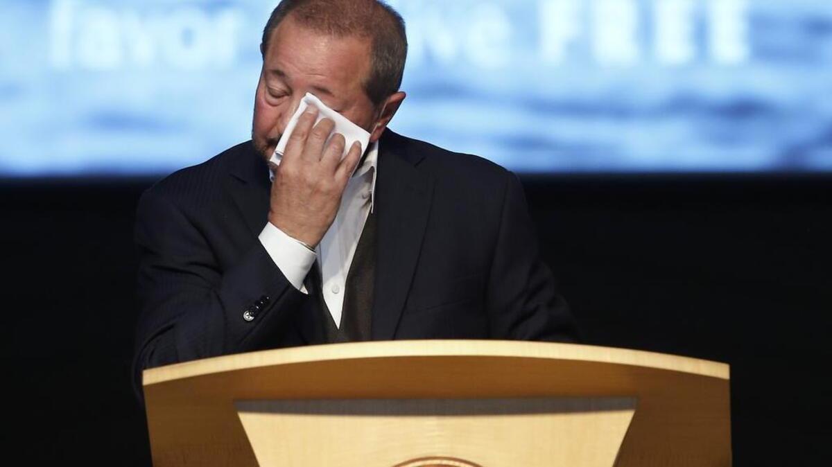 
Pastor Craig Schlesinger wipes his eyes as he talks about the fatal shootings at Umpqua Community College during church services at the Garden Valley Community Church on Sunday, Oct. 4, 2015, in Roseburg, Ore. Armed with multiple guns, suspect Chris Harper-Mercer walked into a class at Snyder Hall on Thursday, killing nine and wounding several others before taking his own life.
