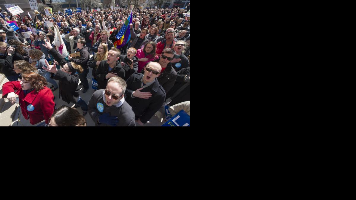 
Opponents of Indiana Senate Bill 101, the Religious Freedom Restoration Act, gather on the lawn of the Indiana State House to rally against that legislation Saturday, March 28, 2015. 
