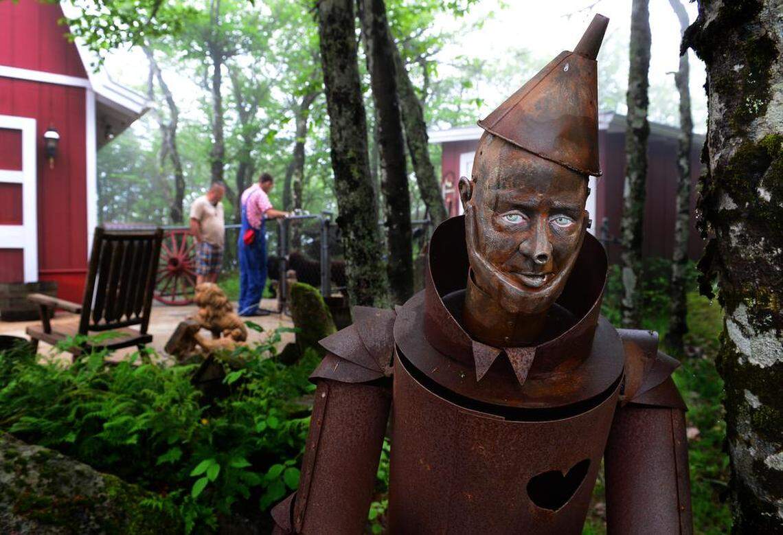 Among the relics at Land of Oz is the rusty Tin Man. Along the Yellow Brick Road visitors encounter fanciful mushrooms, scowling trees and a witch’s castle.