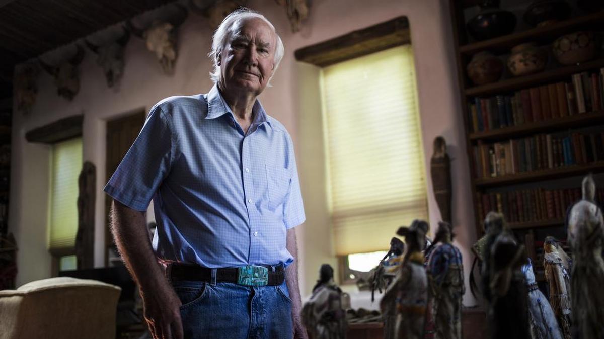 Forrest Fenn, a successful art dealer, self-published a memoir hinting at a buried treasure that has sent thousands of hunters out to scour the New Mexico wilderness. Fenn, shown at his home in Santa Fe, N.M., says he wanted to give families a reason to “get off their couches,” though some suspect he just wanted to goose interest in his memoir.