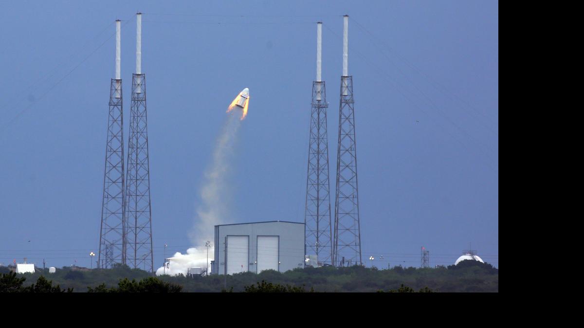 
SpaceX's Dragon capsule launches, Wednesday, May 6, 2015, from Cape Canaveral, Fla. SpaceX fired the mock-up capsule to test the new, super-streamlined launch escape system for astronauts. 
