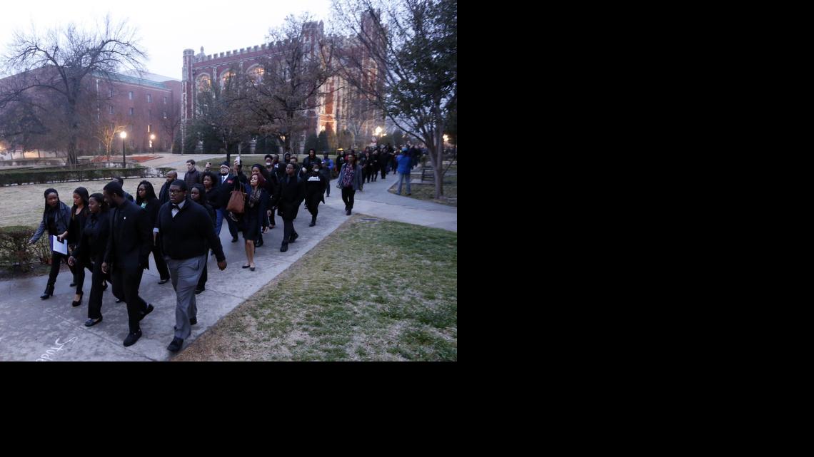 
Students at the University of Oklahoma protest a fraternity's racist comments on Monday, March 9, 2015 in Norman, Okla. University President David Boren lambasted members of Sigma Alpha Epsilon fraternity on Monday who participated in a racist chant caught on video, calling them disgraceful and their behavior reprehensible, and ordered that their house be vacated by midnight Tuesday. 
