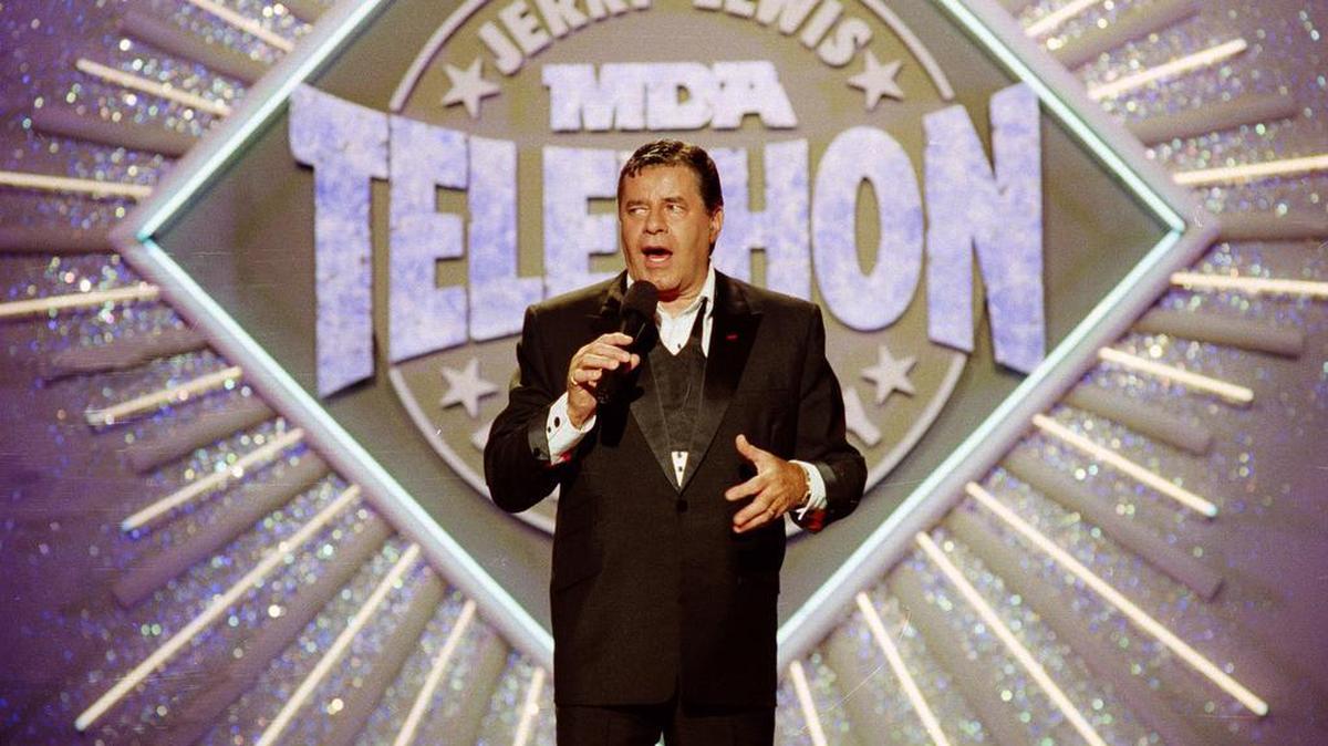 In this Sept. 2, 1990, file photo, entertainer Jerry Lewis makes his opening remarks at the 25th anniversary of the Jerry Lewis Muscular Dystrophy Association Labor Day Telethon fundraiser in Los Angeles. Lewis, the comedian whose fundraising telethons became as famous as his hit movies, has died at age 91 according to his publicist.