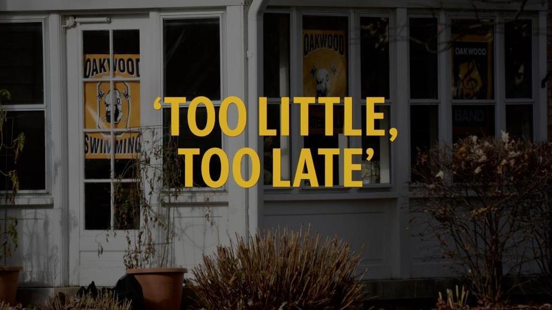 A home near Oakwood High School displays banners for Oakwood swimming, water polo and band. Many houses in Oakwood, Ohio have similar banners.