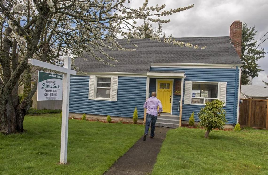 Real estate broker James Pitts III enters the North Tacoma home April 20 that he had just sold. It was the childhood home of serial murderer Ted Bundy.