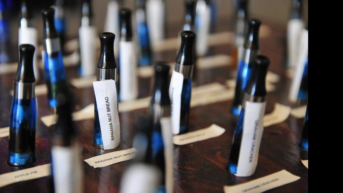 
A variety of e-cigarette flavors at Vapor Haven in Oklahoma City, on display March 10, 2014. Some 13 percent of middle-and-high school students are using e-cigarettes, a sharp rise that led to an overall increase of teens using tobacco products, the first in years. 
