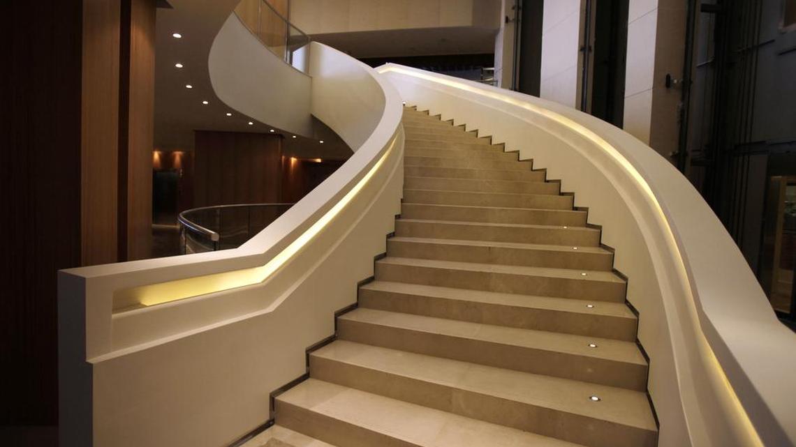 
Stairs run up the Trump Ocean Club International Hotel and Tower in Panama City, Panama, in June 2011. During the four years that Trump Panama Condominium Management LLC had managed the property, Central America’s largest building, a team installed by the Trump family was accused of running up more than $2 million in unauthorized debts, paying its executives undisclosed bonuses and withholding basic financial information from owners. The tale of the 70-story waterfront tower along Panama Bay that was managed by the Trump empire offers insight into the Republican presidential candidate’s business traits and hints about the management style that might be expected from a Trump White House. 
