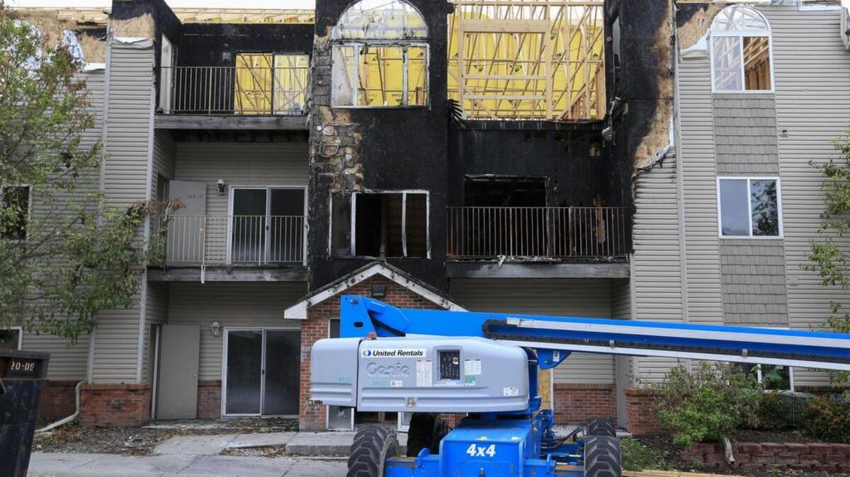Restoration work is performed Wednesday, Sept. 14, 2016, at a Bellevue, Neb., apartment complex which was hit twice by fire. The second fire on July 26 destroyed the building, displacing dozens of people and injured four, including a firefighter. The fires prompted City Councilman Don Preister to introduce a measure to ban smoking in city apartment complexes.