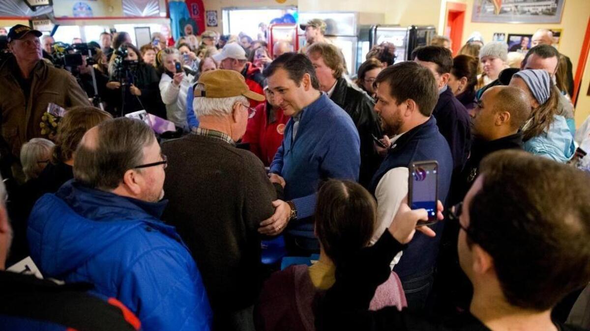 Republican presidential candidate Sen. Ted Cruz, R-Texas, meets with attendees during a campaign stop, Monday, Jan. 18, 2016, in Tilton, N.H.