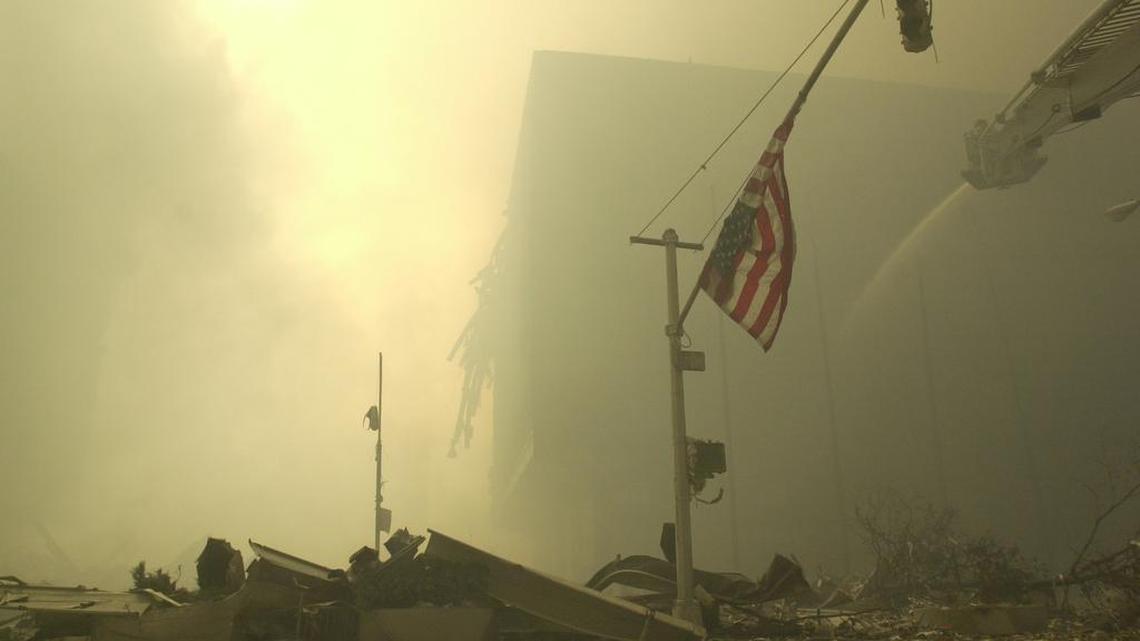 An American flag at ground zero on the evening of Sept. 11, 2001 after the September 11 terrorist attacks on the World Trade Center in New York City.