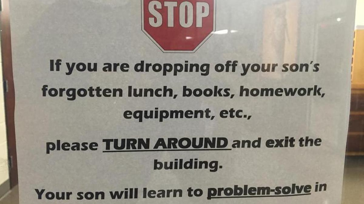 Principal Steve Straessle posted this sign on a front door at the Catholic School for Boys in Little Rock, Arkansas. The sign, shared on Facebook more than 120,000 times, has proven polarizing.
