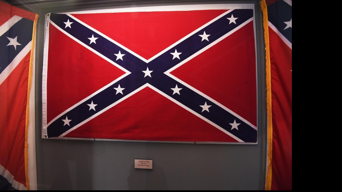 
Confederate flags that once flew at the South Carolina Statehouse are displayed at the South Carolina State Museum, June 24, 2015, in Columbia, S.C. 

