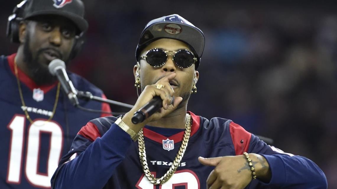 Singer B.o.B. performs at halftime of an AFC Wild Card NFL game Saturday, Jan. 7 in Houston.