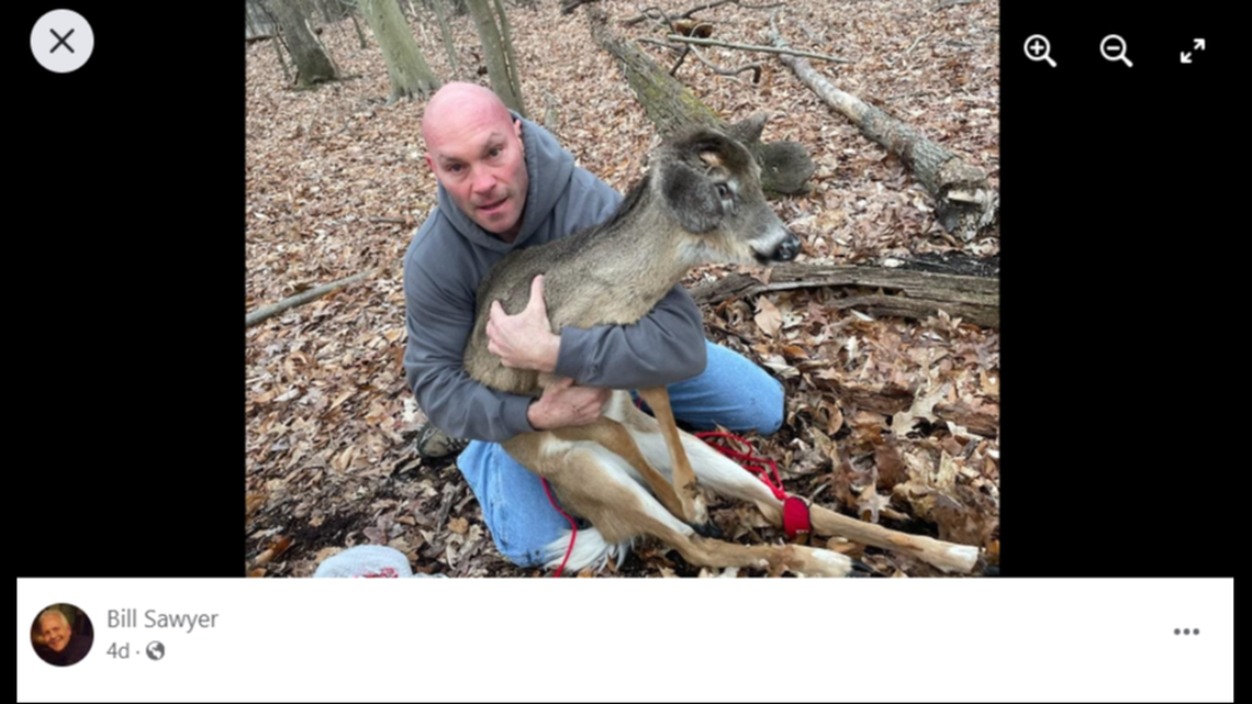 Matt Mertz after saving deer and removing plastic container from its head. 