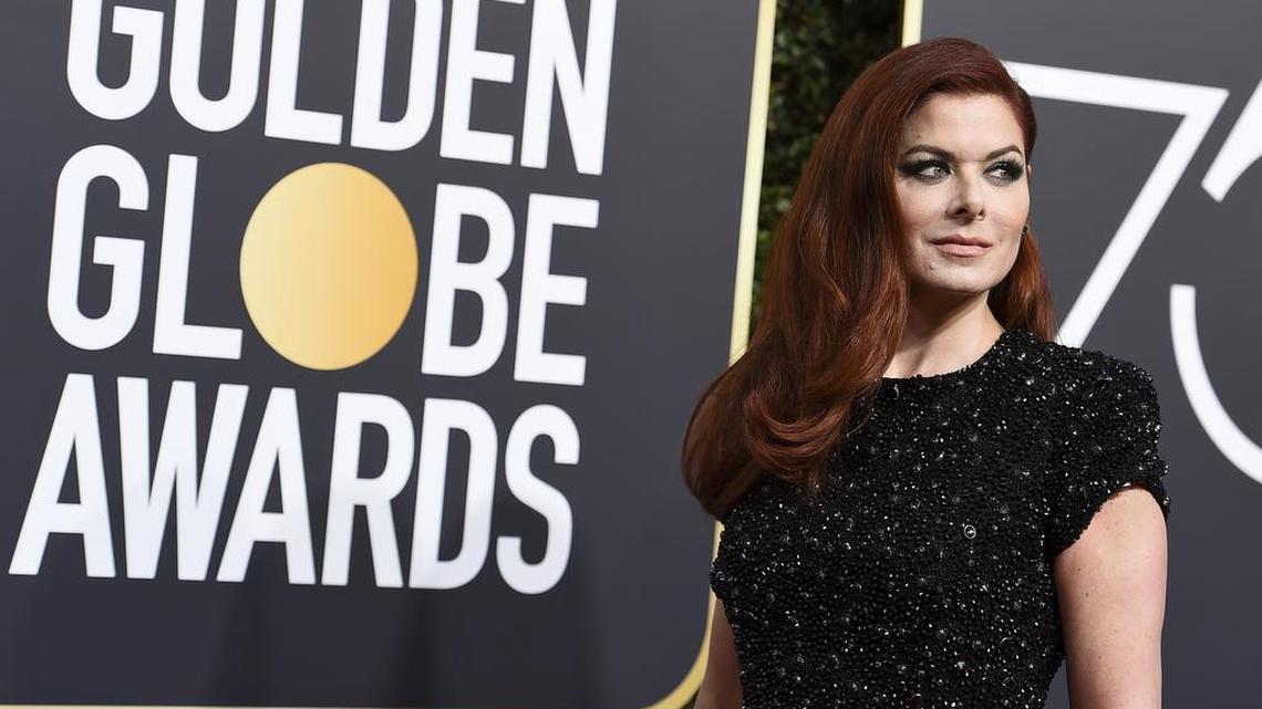 Debra Messing arrives at the 75th annual Golden Globe Awards at the Beverly Hilton Hotel on Sunday, Jan. 7, 2018, in Beverly Hills, Calif.