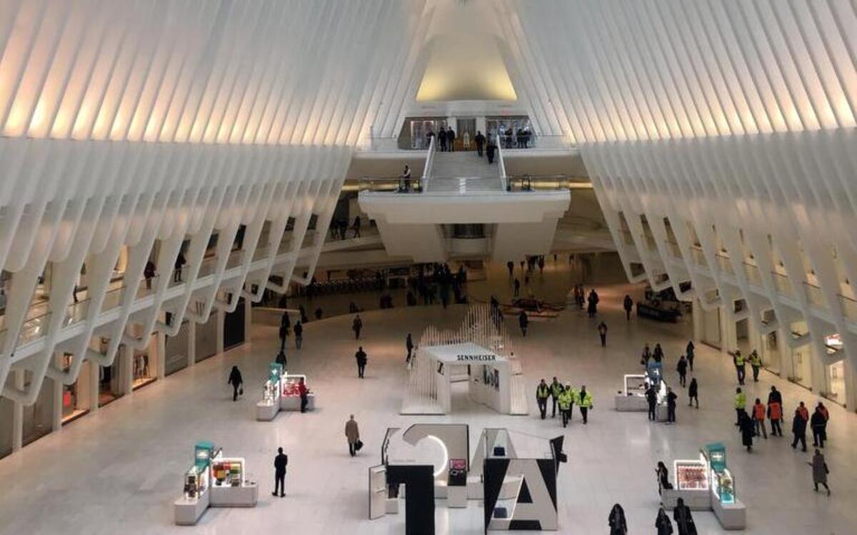 Police say a 29-year-old woman plunged about 30 feet to her death off an escalator inside the World Trade Center Oculus.