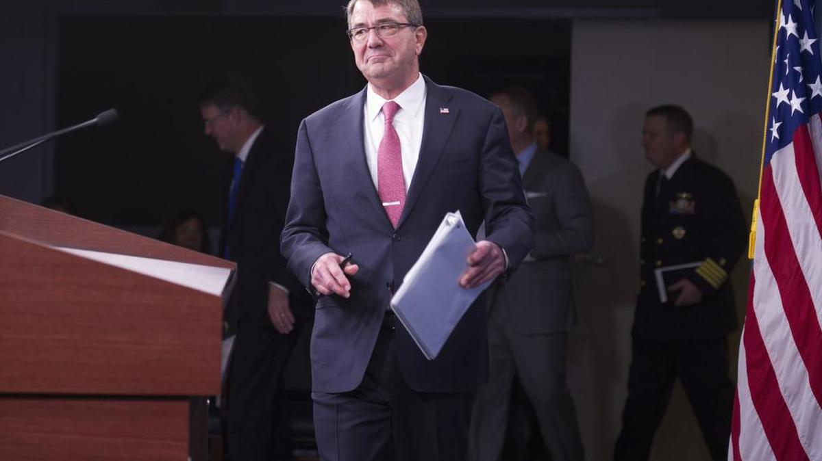 Defense Secretary Ash Carter arrives for a news conference at the Pentagon on Thursday, Dec. 3, 2015, to announce that he has ordered the military to open all combat jobs to women, and is giving the armed services until Jan. 1 to submit plans to make the historic change.