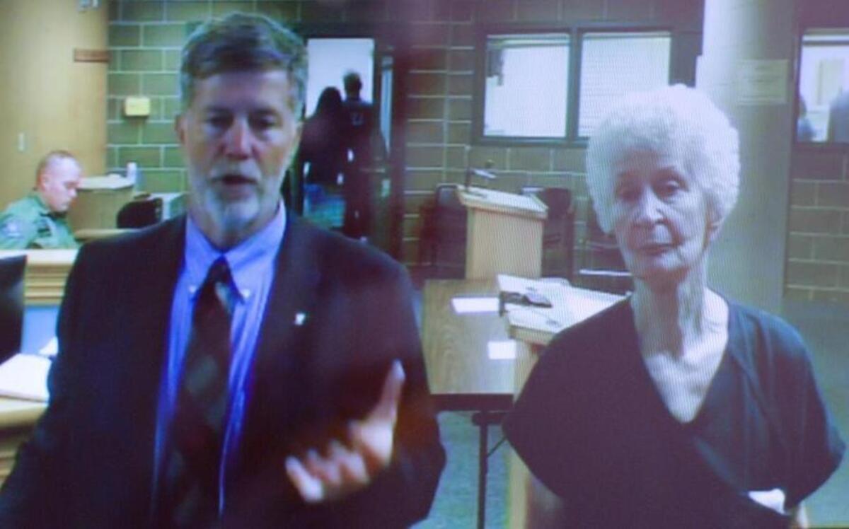 Linda Jane Houser, 83, appears in Whatcom Superior Court on Monday, July 25, with her attorney, Tom Lester. Houser is accused of hitting her husband over the head with a cast iron skillet at their Bellingham home Saturday morning.