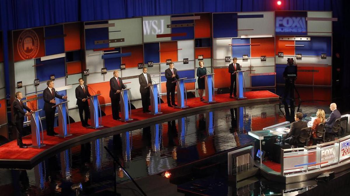 Republican presidential candidates John Kasich, Jeb Bush, Marco Rubio, Donald Trump, Ben Carson, Ted Cruz, Carly Fiorina and Rand Paul appear during Republican presidential debate at Milwaukee Theatre, Nov. 10, 2015, in Milwaukee.