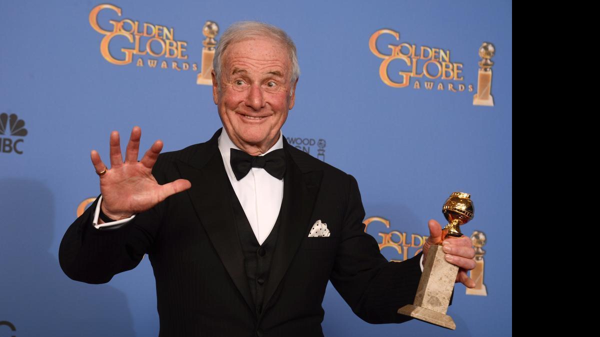 
 Producer Jerry Weintraub poses on Jan. 12, 2014, in the press room with the award for best mini-series or motion picture made for television for "Behind the Candelabra" at the 71st annual Golden Globe Awards in Beverly Hills, Calif. Weintraub, the dynamic producer and manager who pushed the career of John Denver and produced such hit movies as "Nashville" and "Ocean's Eleven," died, Monday, July 6, 2015, of cardiac arrest in Santa Barbara, Calif. He was 77. 
