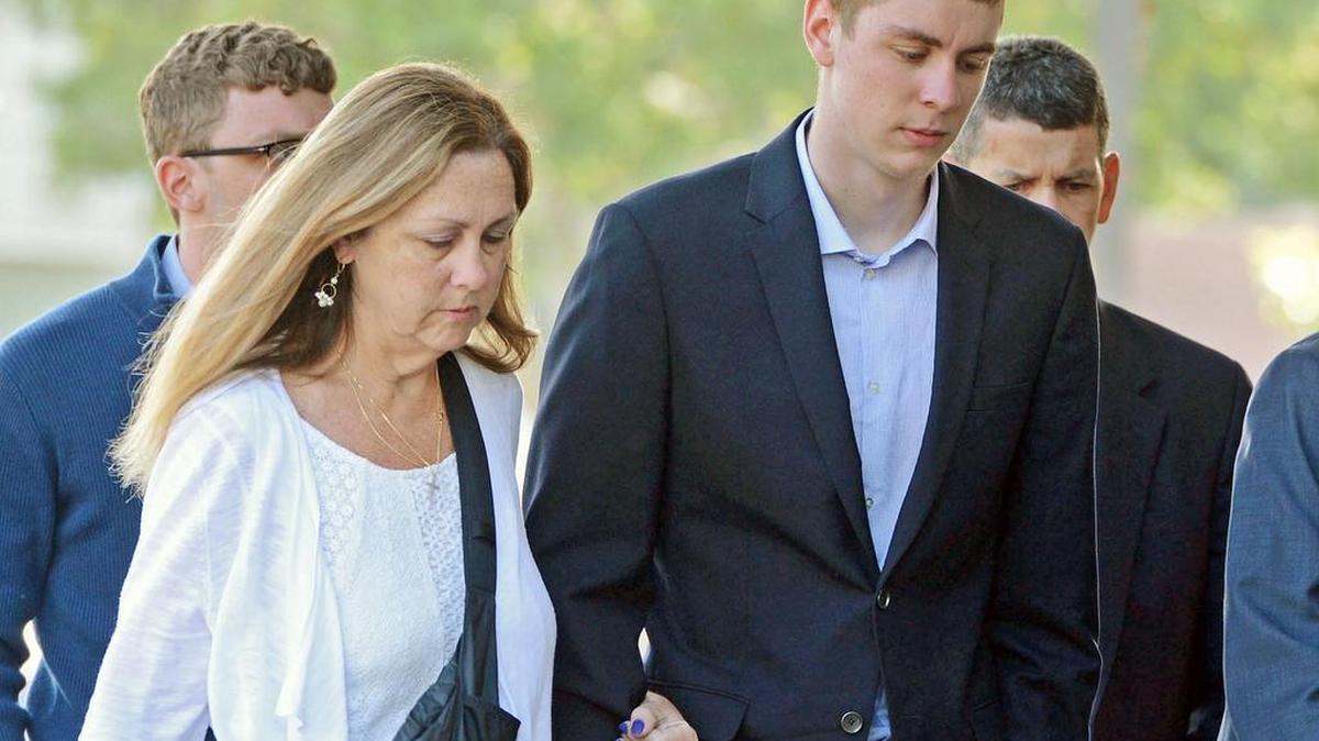 Brock Turner, 20, right, makes his way into the Santa Clara Superior Courthouse in Palo Alto, Calif. The six-month jail term given to Turner, the former Stanford University swimmer who sexually assaulted an unconscious woman after both attended a fraternity party, is being decried as a token punishment.