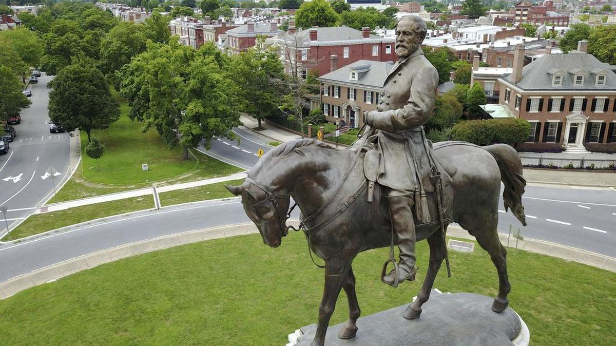This Tuesday June 27, 2017, photo shows the statue of Confederate Gen. Robert E. Lee that stands in the middle of a traffic circle on Monument Avenue in Richmond, Va.