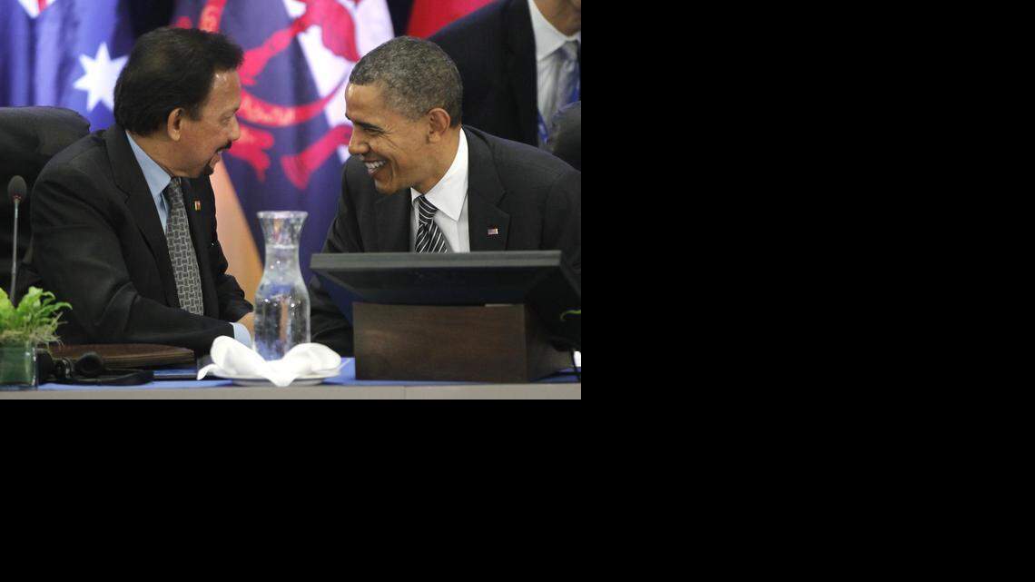 
President Barack Obama talks with Brunei Sultan Hassanal Bolkiah as he meets with Trans-Pacific Partnership leaders during the APEC summit in Honolulu, Hawaii, on Nov. 12, 2011.
